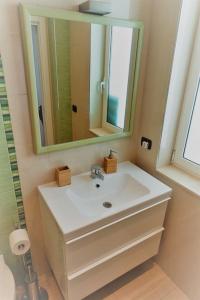 Koupelna v ubytování BARI 68 - Comfort moderno & fascino antico