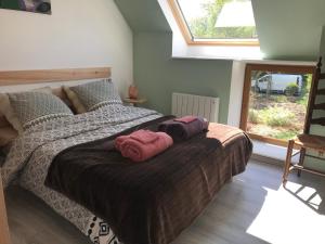 Postel nebo postele na pokoji v ubytování Le jardin des fées