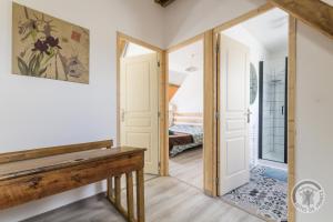 Postel nebo postele na pokoji v ubytování Le jardin des fées