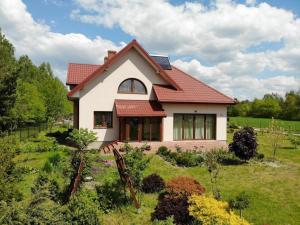 Vonkajšia záhrada v ubytovaní Agroturystyka przy lesie