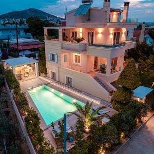 an aerial view of a house with a swimming pool at Coastline maisonette near Athens Airport and Rafina Port in Artemida