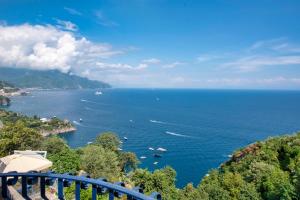 a view of a large body of water with boats at Casa Rosaria in Conca dei Marini