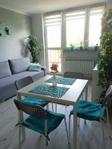 Posedenie v ubytovaní GreatHome Apartament