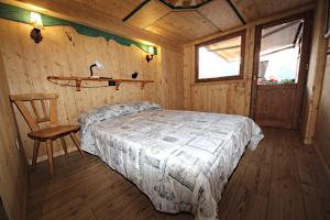 Postel nebo postele na pokoji v ubytování Albergo Diffuso Costauta