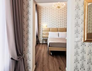 En eller flere senge i et værelse på Palazzo Orseolo- Gondola View