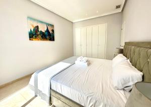 Posteľ alebo postele v izbe v ubytovaní Reinapart Patacona Beachfront Seaview