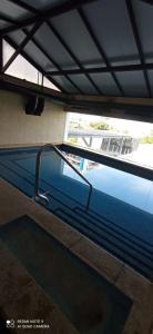 a view of a swimming pool in a building at Apartamento in Punta del Este