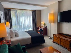 Voodi või voodid majutusasutuse Hotel Divinus toas
