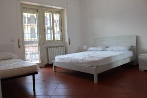 Ένα ή περισσότερα κρεβάτια σε δωμάτιο στο Terrazza del mare