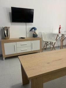 TV a/nebo společenská místnost v ubytování Danubio Studio Playa del Inglés