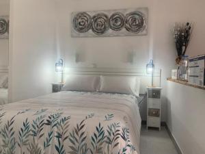 Łóżko lub łóżka w pokoju w obiekcie Danubio Studio Playa del Inglés