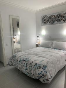 Łóżko lub łóżka w pokoju w obiekcie Danubio Studio Playa del Inglés