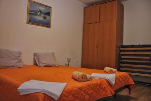 Postel nebo postele na pokoji v ubytování Zsh Apartment