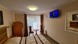 TV a/nebo společenská místnost v ubytování Pokoje Gościnne Ster