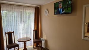 TV a/nebo společenská místnost v ubytování Pokoje Gościnne Ster