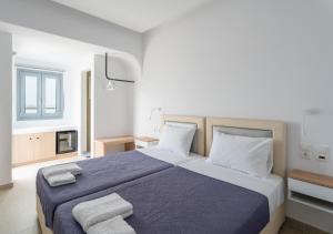 Giường trong phòng chung tại Liana sunset