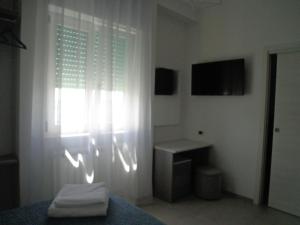 ガリポリにあるAuroraの窓、デスク、テレビが備わるベッドルーム1室が備わります。