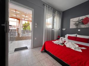 Postel nebo postele na pokoji v ubytování Niriides Rooms