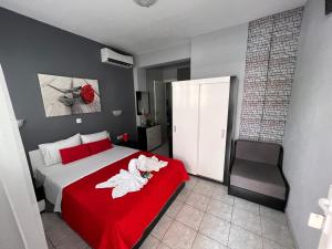 Postel nebo postele na pokoji v ubytování Niriides Rooms