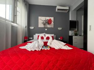 Postel nebo postele na pokoji v ubytování Niriides Rooms