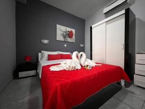 Postel nebo postele na pokoji v ubytování Niriides Rooms