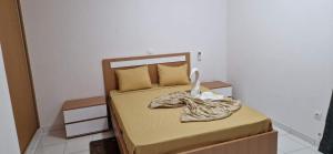 Ένα ή περισσότερα κρεβάτια σε δωμάτιο στο PIMONTAPARTMENTS
