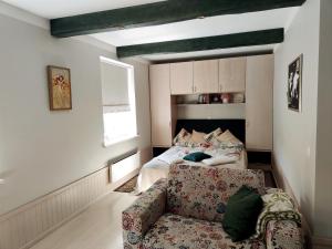 Postel nebo postele na pokoji v ubytování Arte Apartment