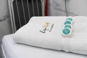 a towel on top of a crib with a blanket at Blue Sea Apartment & SPA 8/2 in Dziwnów