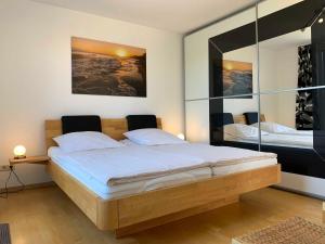 Ein Bett oder Betten in einem Zimmer der Unterkunft Zinnowitz Haus Zur Duene Wohnung 14 W14ZDL