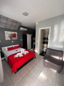 Postel nebo postele na pokoji v ubytování Niriides Rooms
