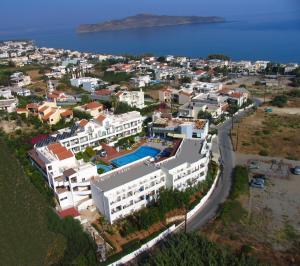 an aerial view of a resort with a swimming pool at Pegasus Hotel in Stalos