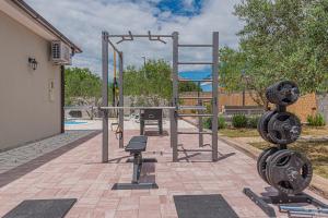 Fitness centrum a/nebo fitness zařízení v ubytování Holiday Home Intrade