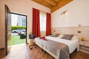 Postel nebo postele na pokoji v ubytování Simon Hotel + 37 fotografií