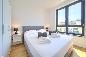 Postel nebo postele na pokoji v ubytování Villa Sabic By The Sea