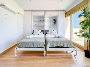 Postel nebo postele na pokoji v ubytování OleHolidays 1133 Romana Playa primera línea playa