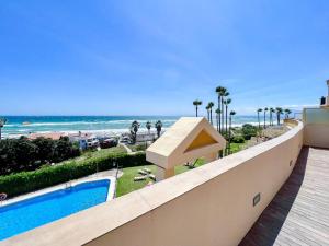 Bazén v ubytování OleHolidays 1133 Romana Playa primera línea playa nebo v jeho okolí