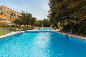 Bazén v ubytování OleHolidays 1133 Romana Playa primera línea playa nebo v jeho okolí
