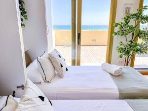Postel nebo postele na pokoji v ubytování OleHolidays 1133 Romana Playa primera línea playa