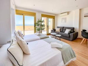 Posezení v ubytování OleHolidays 1133 Romana Playa primera línea playa