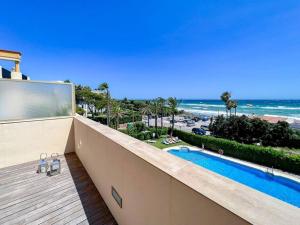Bazén v ubytování OleHolidays 1133 Romana Playa primera línea playa nebo v jeho okolí