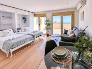 Postel nebo postele na pokoji v ubytování OleHolidays 1133 Romana Playa primera línea playa