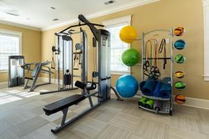 a fitness room with a gym with exercise equipment at Kasa Southside Wilmington in Wilmington