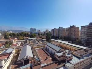 an aerial view of a city with buildings at Departamento Torre Murguía in San Salvador de Jujuy