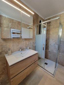 Koupelna v ubytování Gîte élégant au calme