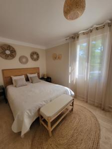 Postel nebo postele na pokoji v ubytování Gîte élégant au calme