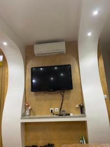 TV o dispositivi per l'intrattenimento presso Apartment Poturmahala