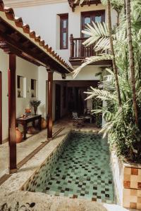Bazén v ubytování Hotel Boutique Santo Toribio nebo v jeho okolí