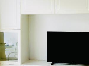 TV a/nebo společenská místnost v ubytování Canaryislandshost I Amanecer