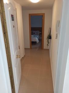 Postel nebo postele na pokoji v ubytování Apartamento Flores de Santiago