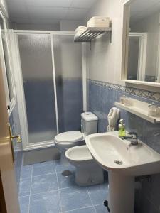 Koupelna v ubytování Apartamento Flores de Santiago + 15 fotografií